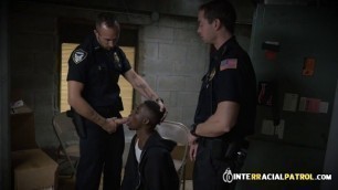 White male cops take turns to fuck bareback black suspect's ass.