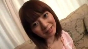 Delightful Japanese girl with a pretty smile exposes