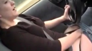 She Fingers Her Pussy While Driving