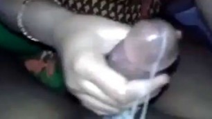 The girl is pleasing his dick with her hands - Indian sex movie