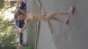 naked Russian girl walks through the city