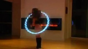 Girl with beautiful booty turns glowing circle
