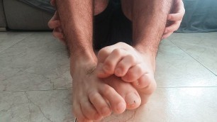 Hot guy massaging his feet. Foot fetish
