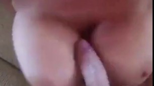 Cumshot on mature tits